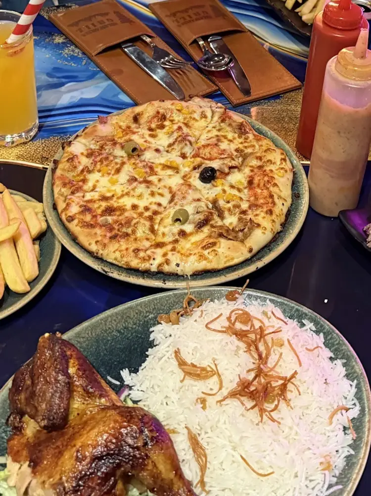 Family-style table at Original Shawarma Grill